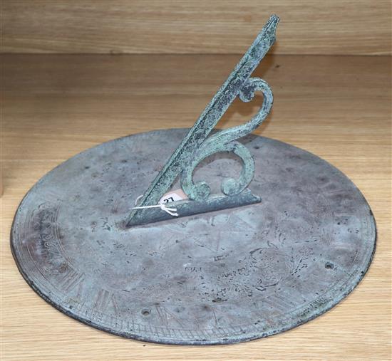 A bronze sundial with gnomon, of star design, inscribed Brixton 1795, dia 46cm, H 45cm (max)